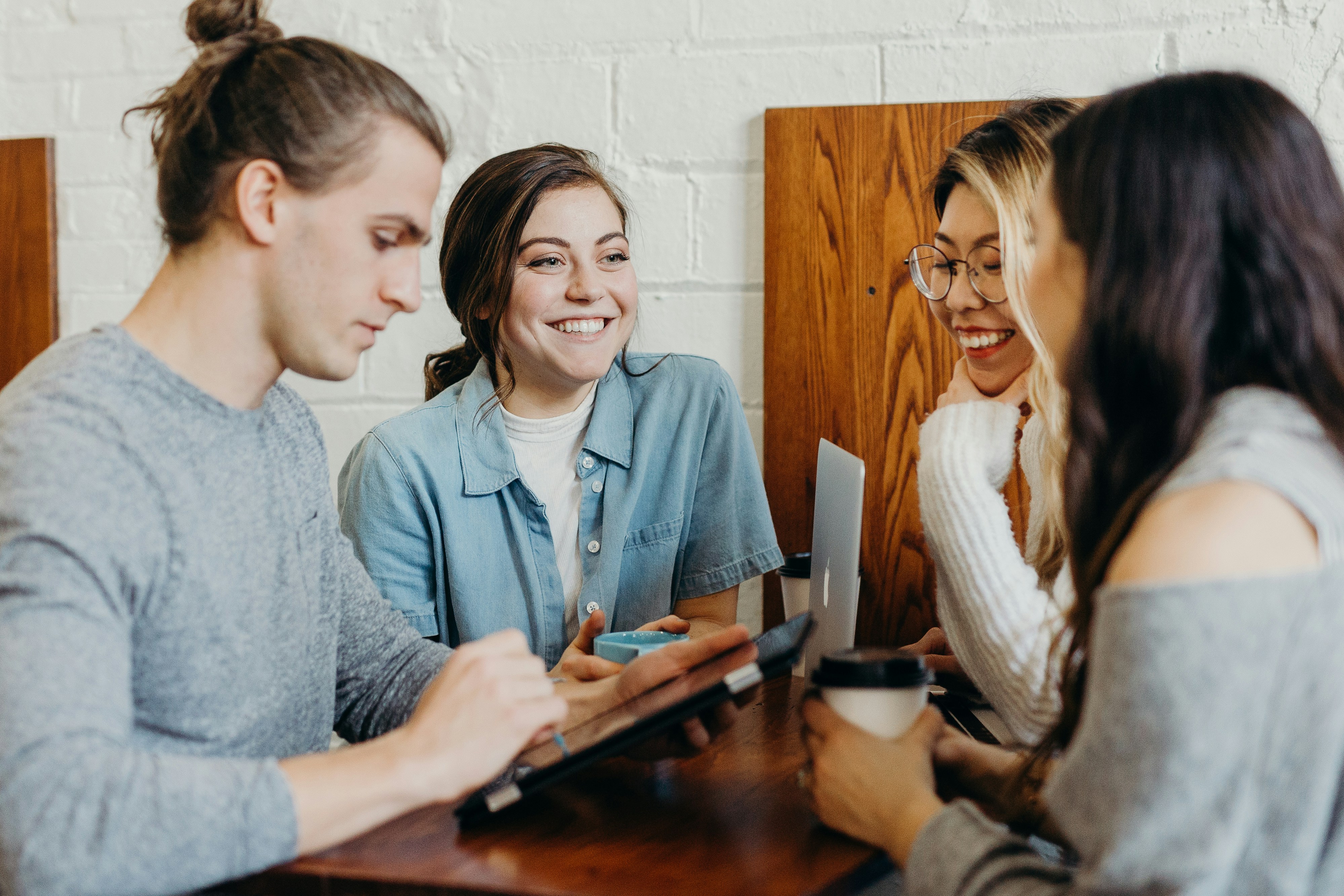 Persons Having a Meeting - Omnichannel Marketing Strategy